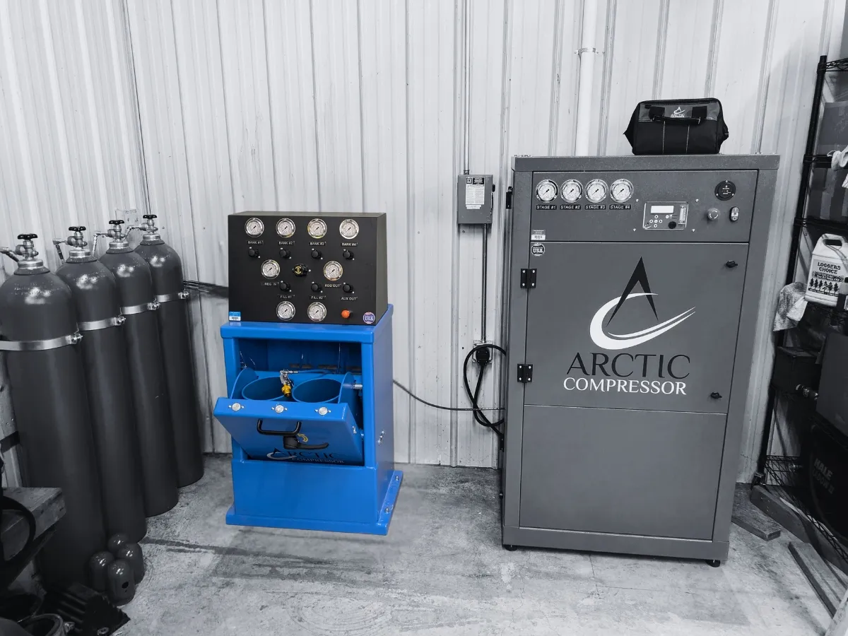 A full Arctic Compressor breathing air system including a compressor, fill station, and air storage cylinders.