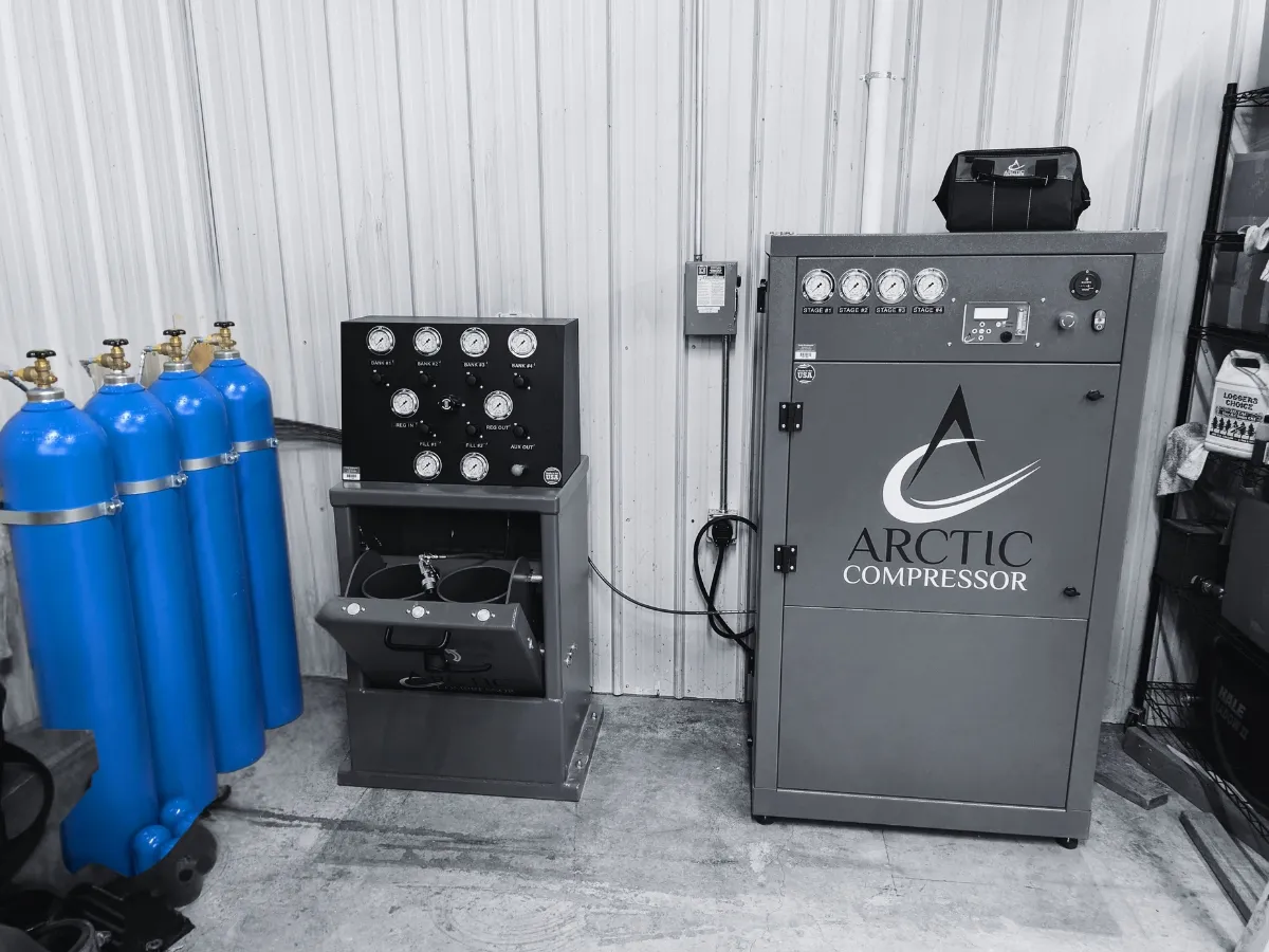 A full Arctic Compressor breathing air system, including a compressor, fill station, and storage cylinders