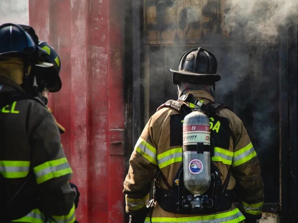 firefighter wearing SCBA cylinder