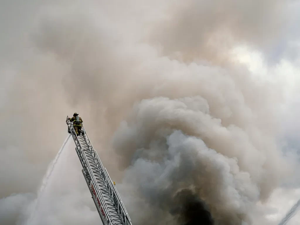 Firefighter with mobile breathing air