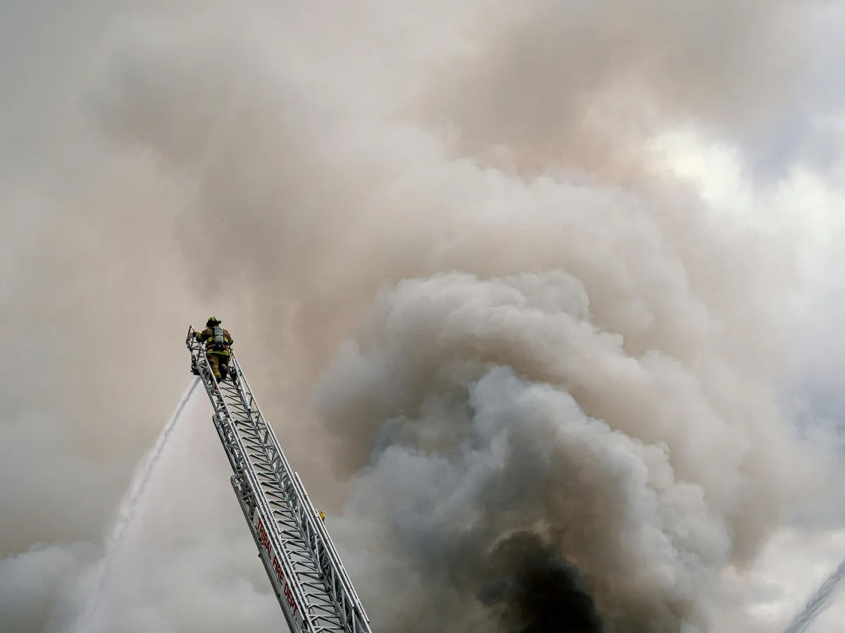 Firefighter with mobile breathing air