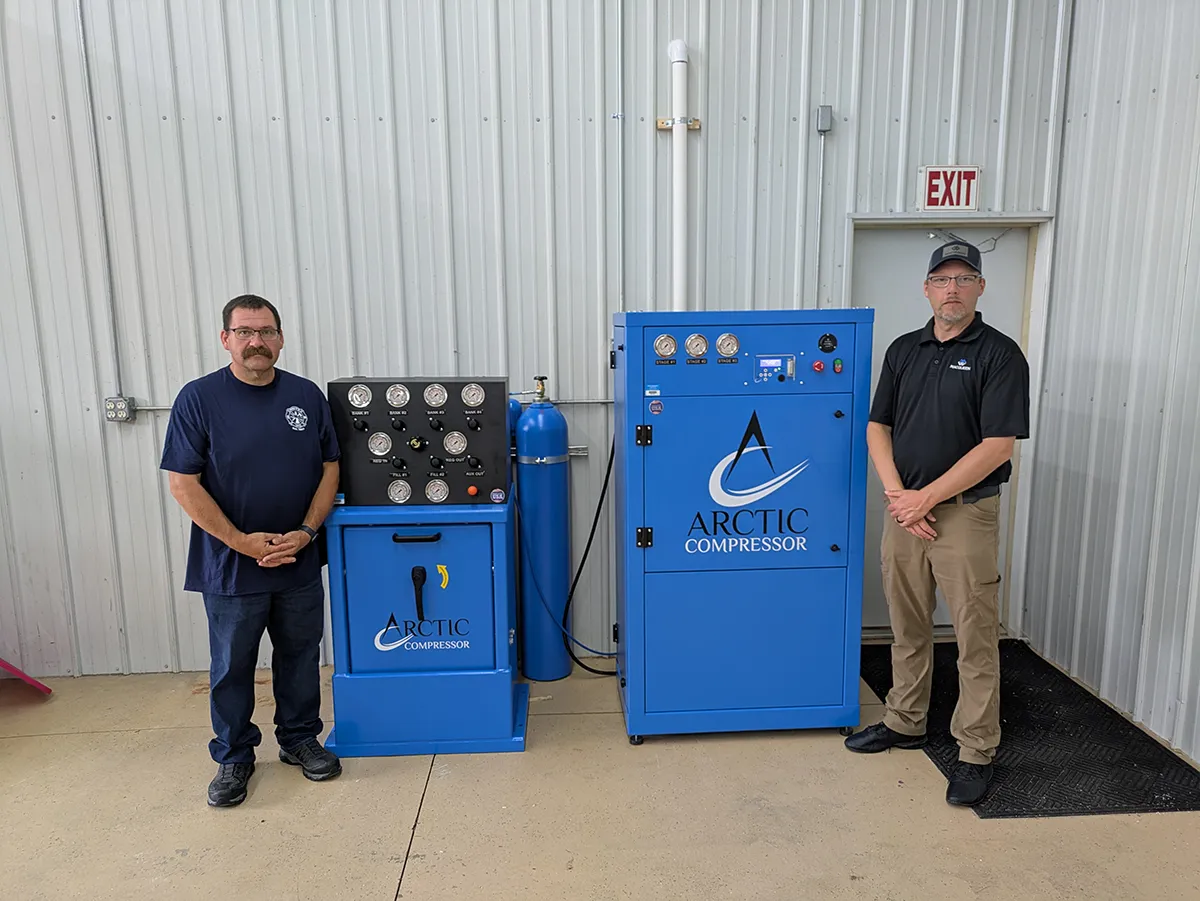 Firefighter standing by Arctic Compressor